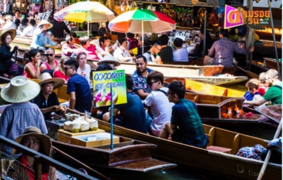 Take a boat trip to Damnoen Saduak Floating Market